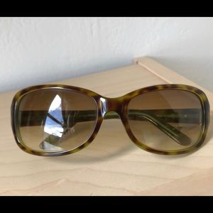 Kate Spade tortoise/green acetate sunglasses.
